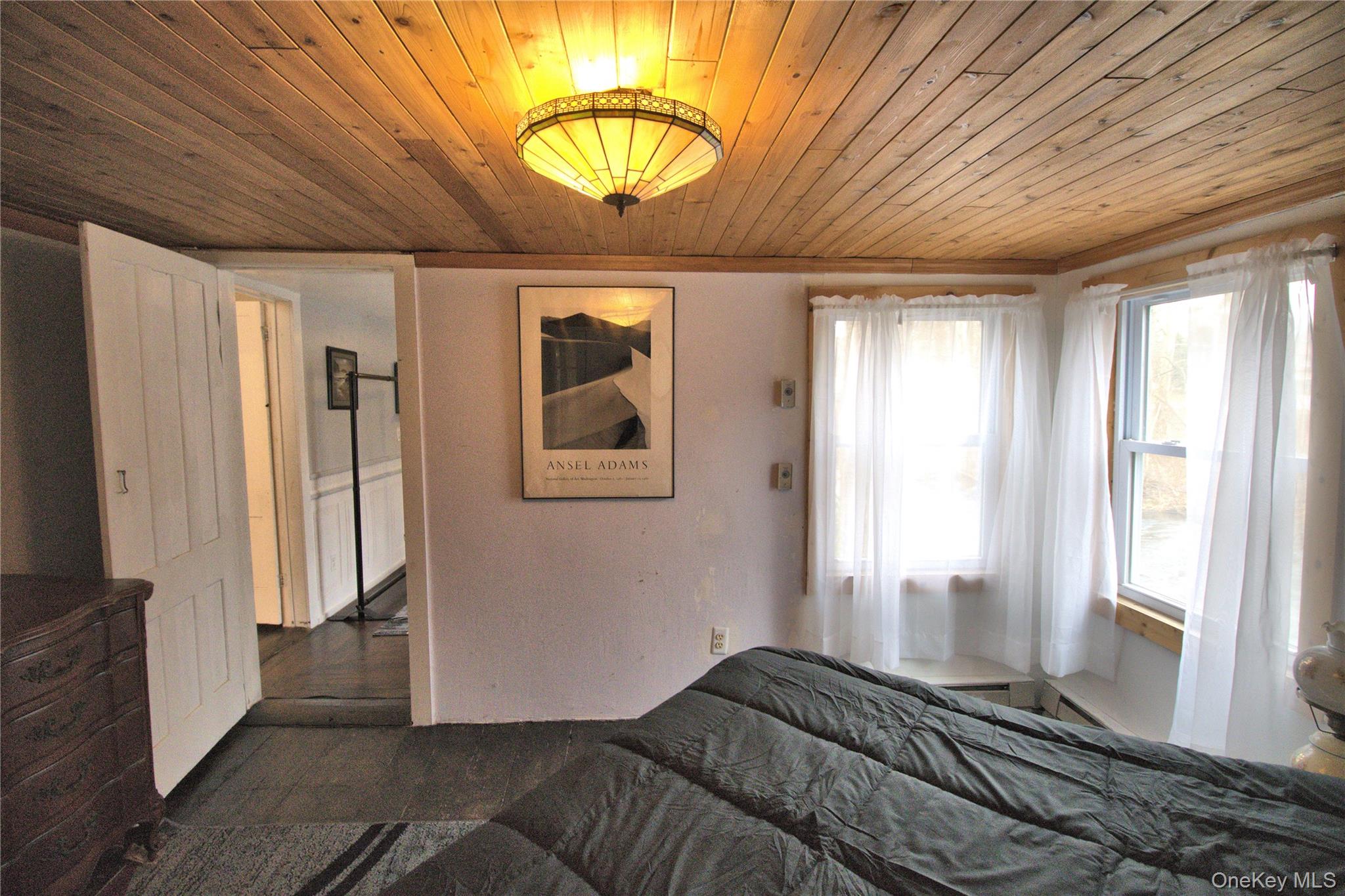 7 State Rte 55 Napanoch, NY 12458 - Photo 6 of 38 a bedroom with furniture and a window