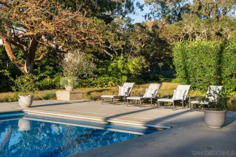a bathroom with a sink and a large mirror