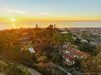 a view of a car in front of a house