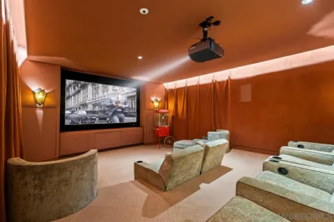 a bedroom with a bed and a table