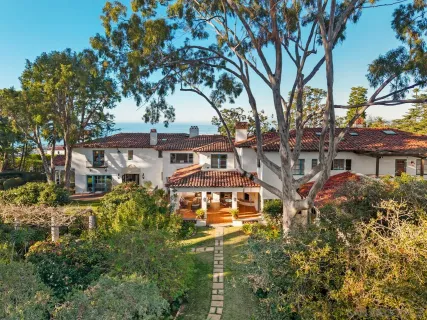 a view of street view with large trees