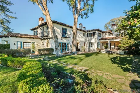 a view of a yard with trees