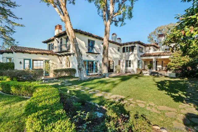 a view of a yard with trees