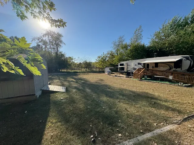 a view of street with car parked