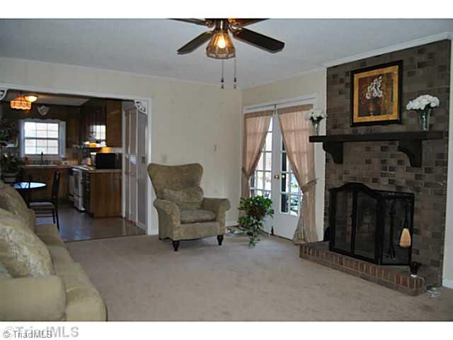 715 Laverton Lane Rural Hall, NC 27045 - Photo 8 of 15 Den/Family/Great Room. double doors to the deck