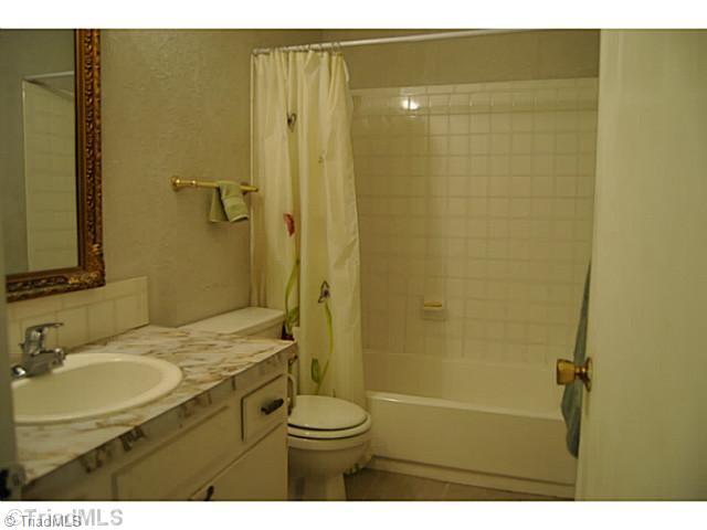 715 Laverton Lane Rural Hall, NC 27045 - Photo 9 of 15 Bath. tile floors and tile surround