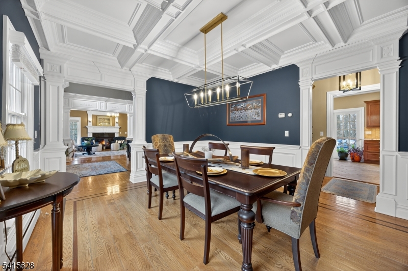 14 Jenny Layne Road Vernon, NJ 07461 - Photo 15 of 42 a view of a dining room with furniture a chandelier and wooden floor