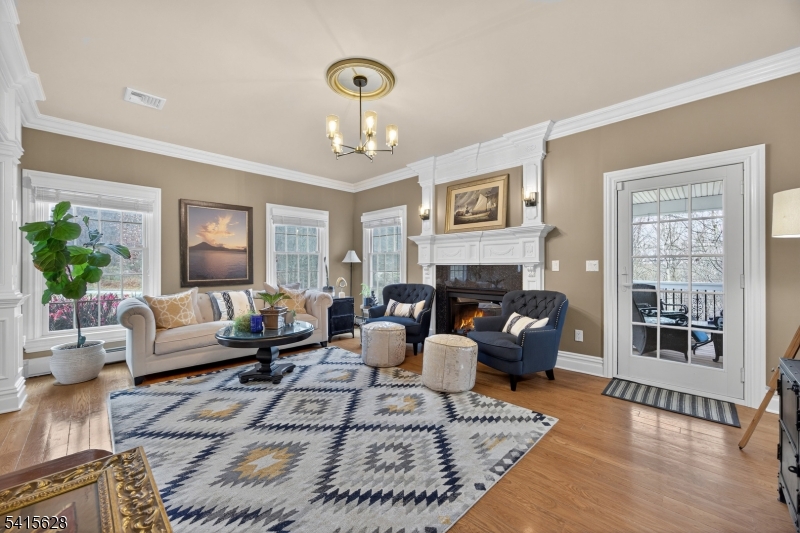 14 Jenny Layne Road Vernon, NJ 07461 - Photo 16 of 42 a living room with furniture and a fireplace