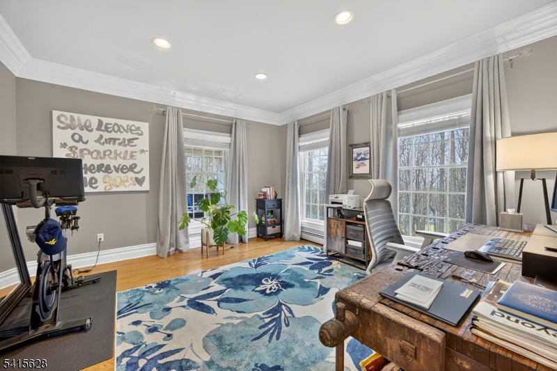 14 Jenny Layne Road Vernon, NJ 07461 - Photo 17 of 42 a living room with furniture a window and a flat screen tv