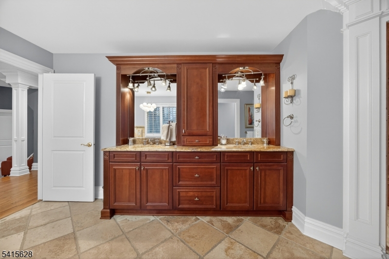 14 Jenny Layne Road Vernon, NJ 07461 - Photo 23 of 42 a bathroom with a double vanity sink and a mirror