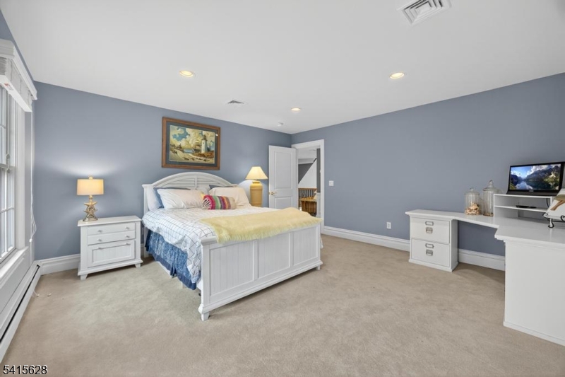 14 Jenny Layne Road Vernon, NJ 07461 - Photo 24 of 42 a bed room with a bed and a couch