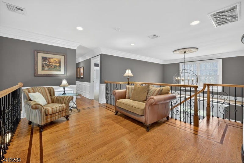 14 Jenny Layne Road Vernon, NJ 07461 - Photo 27 of 42 a living room with furniture and a table