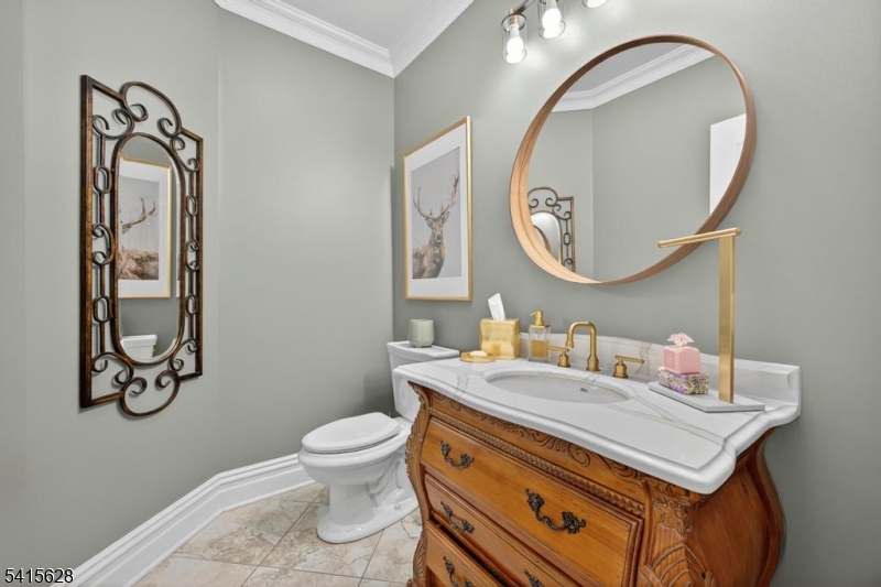 14 Jenny Layne Road Vernon, NJ 07461 - Photo 28 of 42 a bathroom with a toilet a sink and mirror