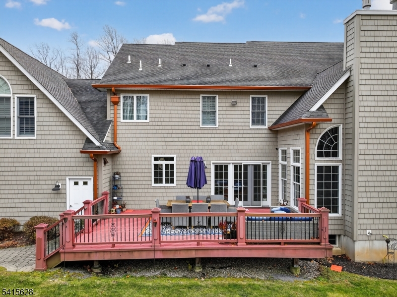 14 Jenny Layne Road Vernon, NJ 07461 - Photo 31 of 42 a view of a house with a wooden deck and a yard