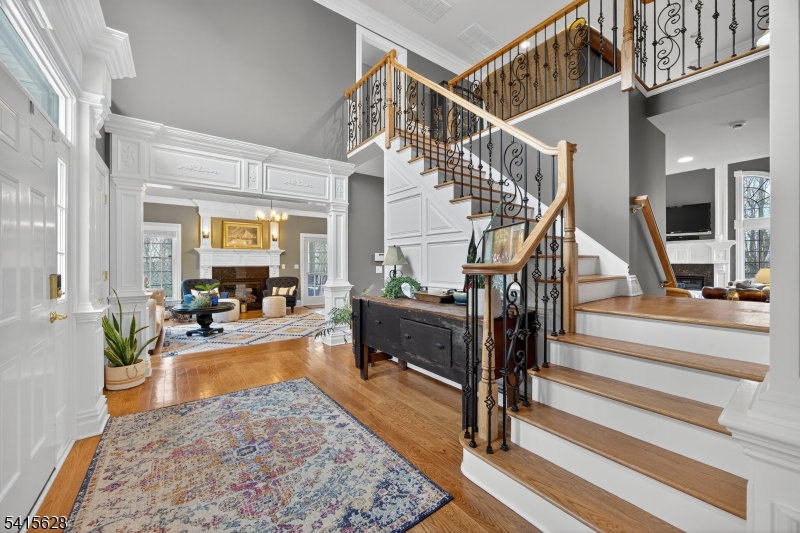 14 Jenny Layne Road Vernon, NJ 07461 - Photo 4 of 42 a living room with wooden floor and a rug