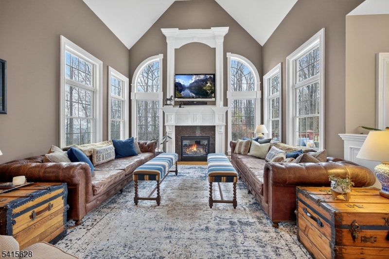 14 Jenny Layne Road Vernon, NJ 07461 - Photo 5 of 42 a living room with furniture and a fireplace