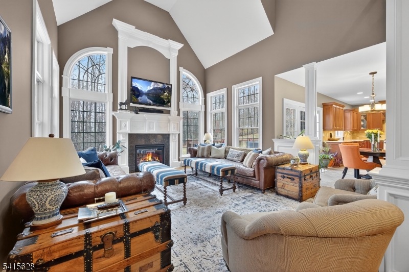 14 Jenny Layne Road Vernon, NJ 07461 - Photo 6 of 42 a living room with furniture fireplace and flat screen tv