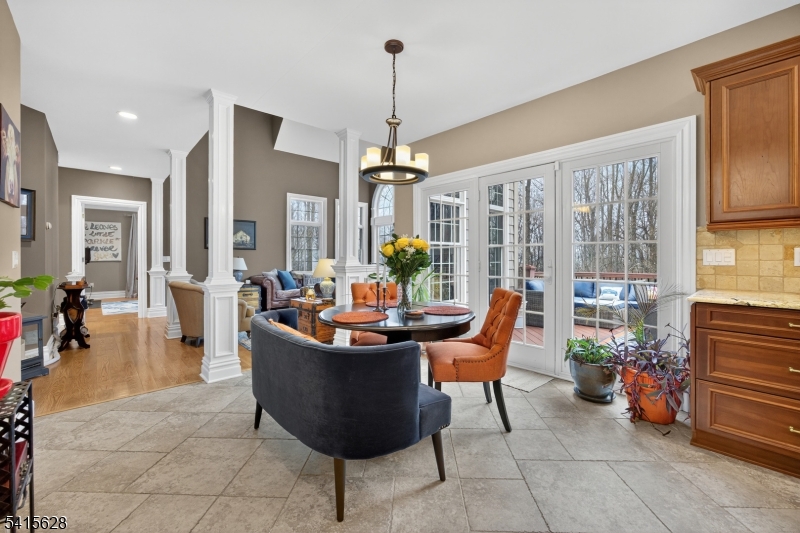 14 Jenny Layne Road Vernon, NJ 07461 - Photo 8 of 42 a living room with furniture a large window and a chandelier