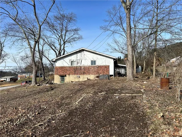 a view of house with a street