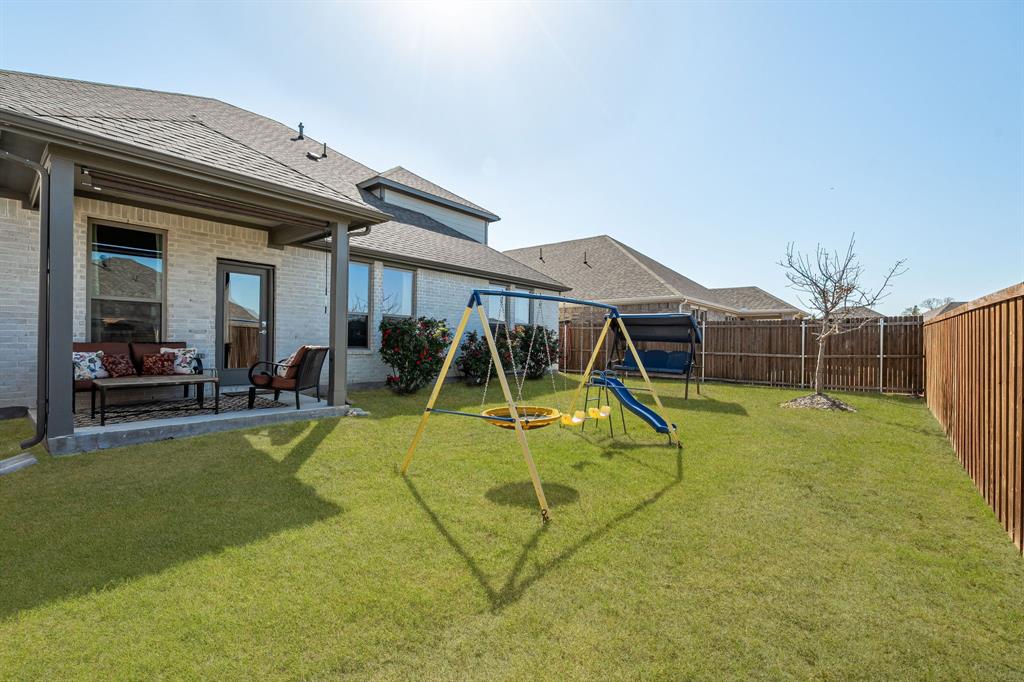 4017 Mapleleaf Pass Melissa, TX 75454 - Photo 29 of 32 a view of a house with swimming pool and a yard