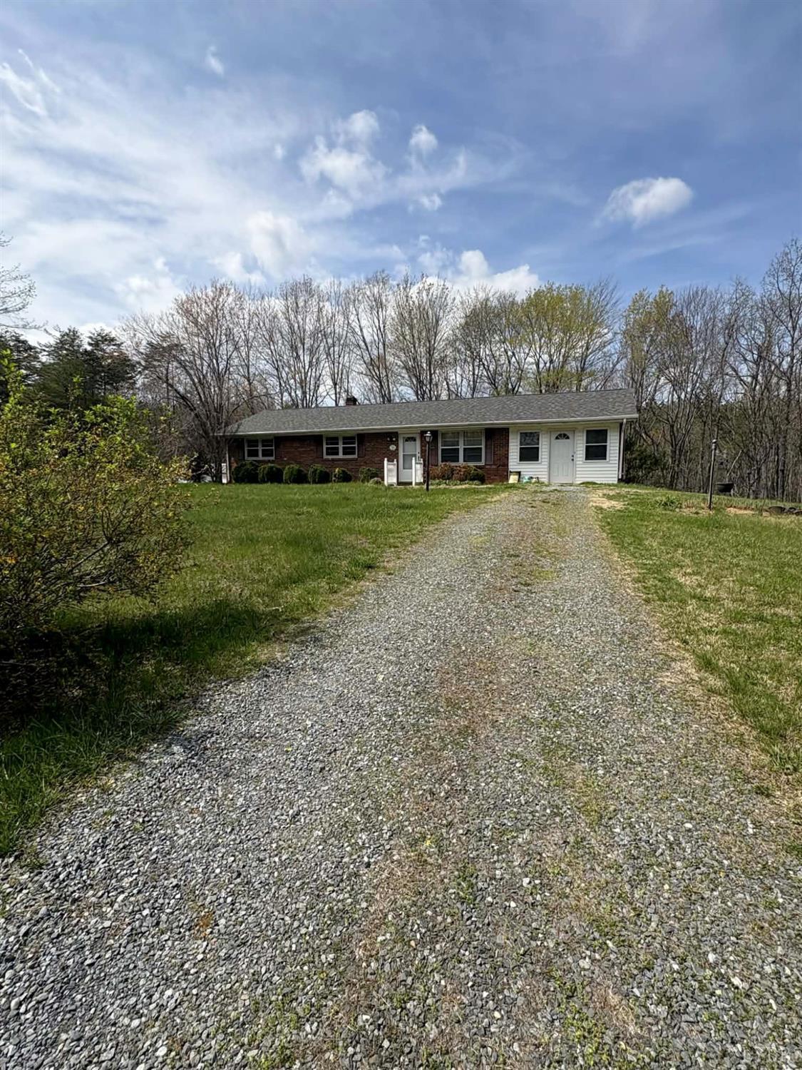 1796 Owens Mill Road Gretna, VA 24557 - Photo 6 of 24 a view of a house with a yard