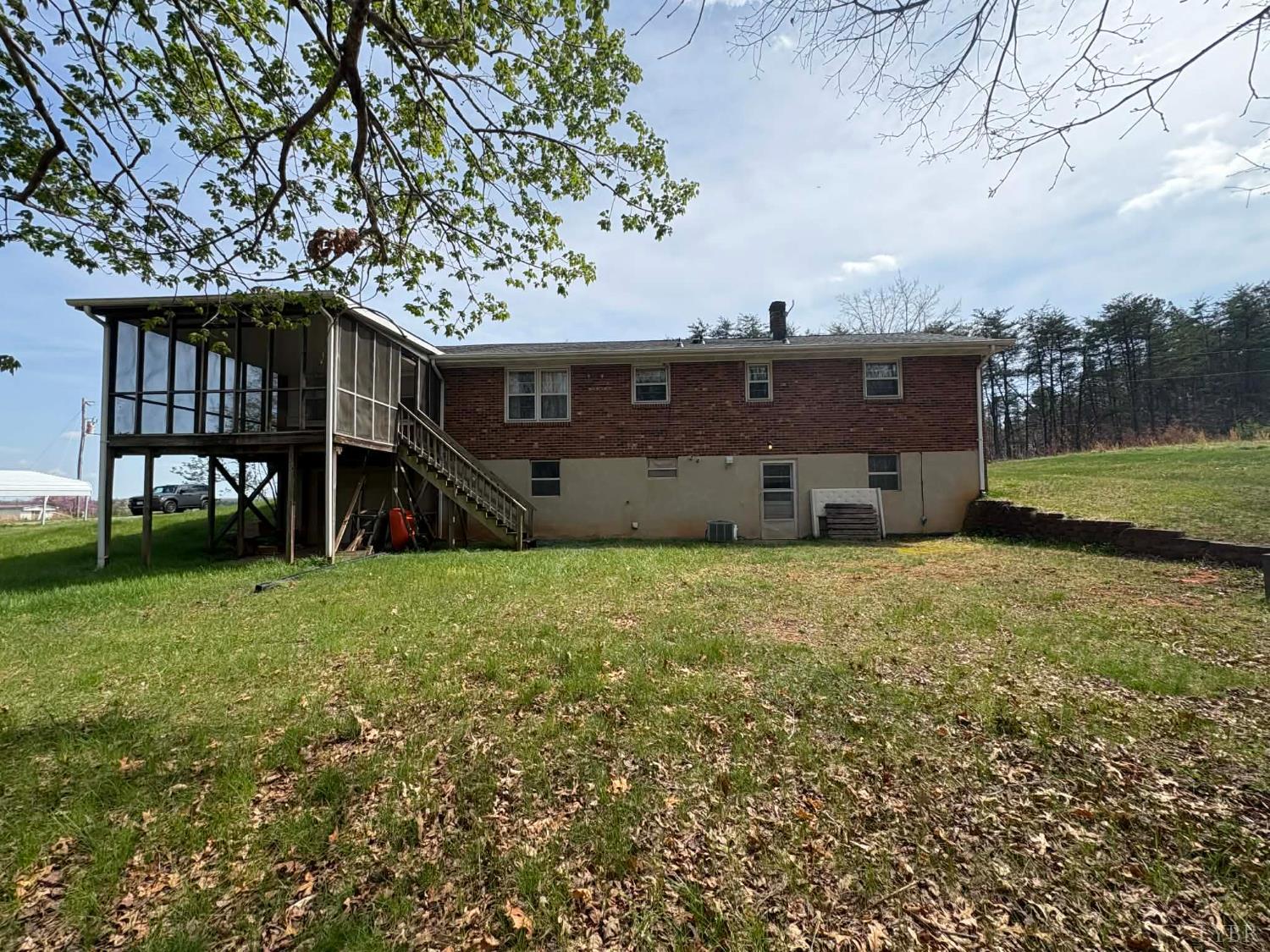 1796 Owens Mill Road Gretna, VA 24557 - Photo 7 of 24 a view of a house with a yard and sitting area