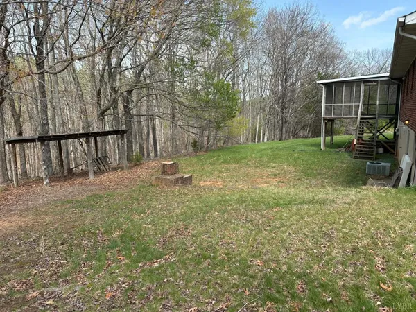 a view of backyard with green space