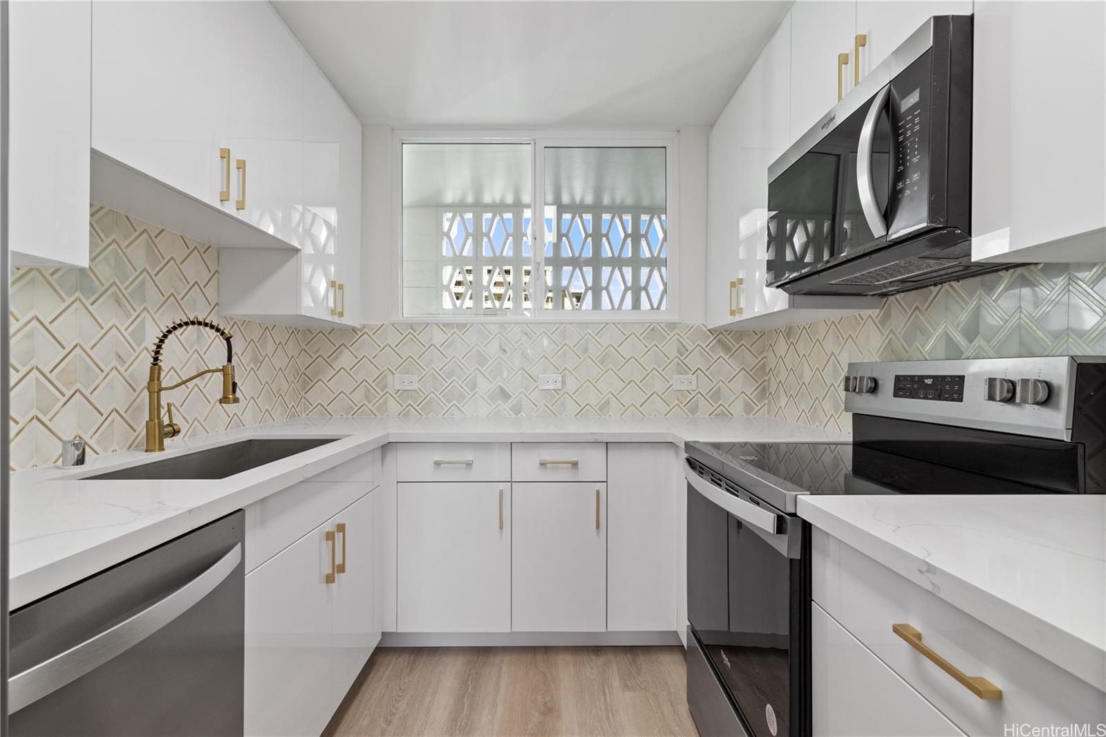 469 Ena Road, Unit 2304 Honolulu, HI 96815 - Photo 1 of 25 A modern kitchen built with meticulous attention to every feature