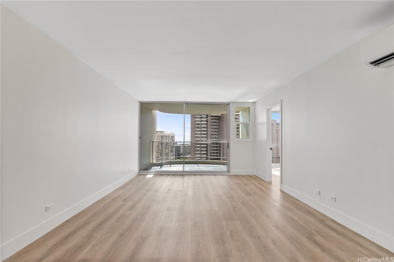469 Ena Road, Unit 2304 Honolulu, HI 96815 - Photo 4 of 25 Living room - Where comfort meets modern living