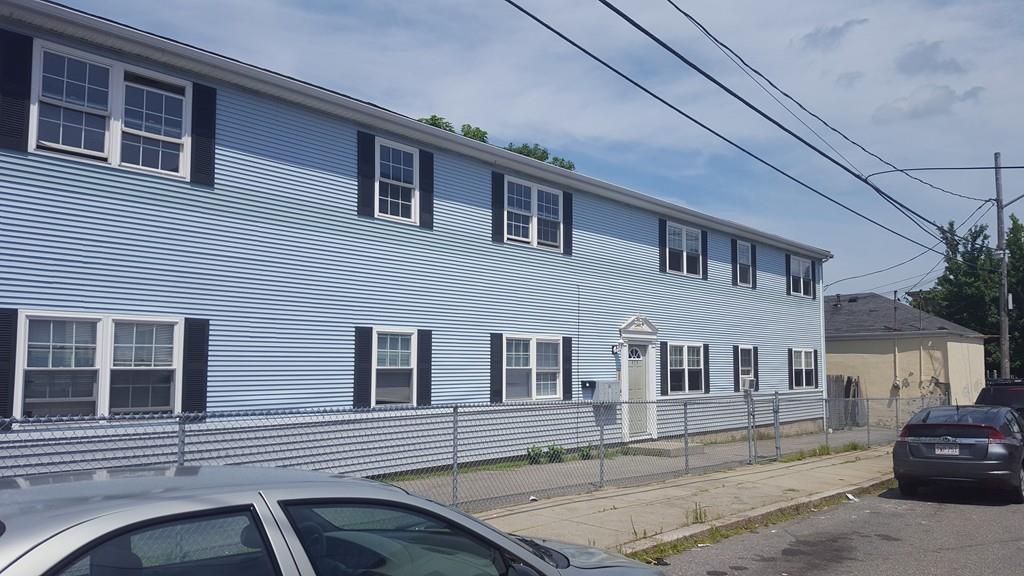 375 Third Street, Unit 4 Fall River, MA 02721 - Photo 2 of 2 a front view of a house with parking space