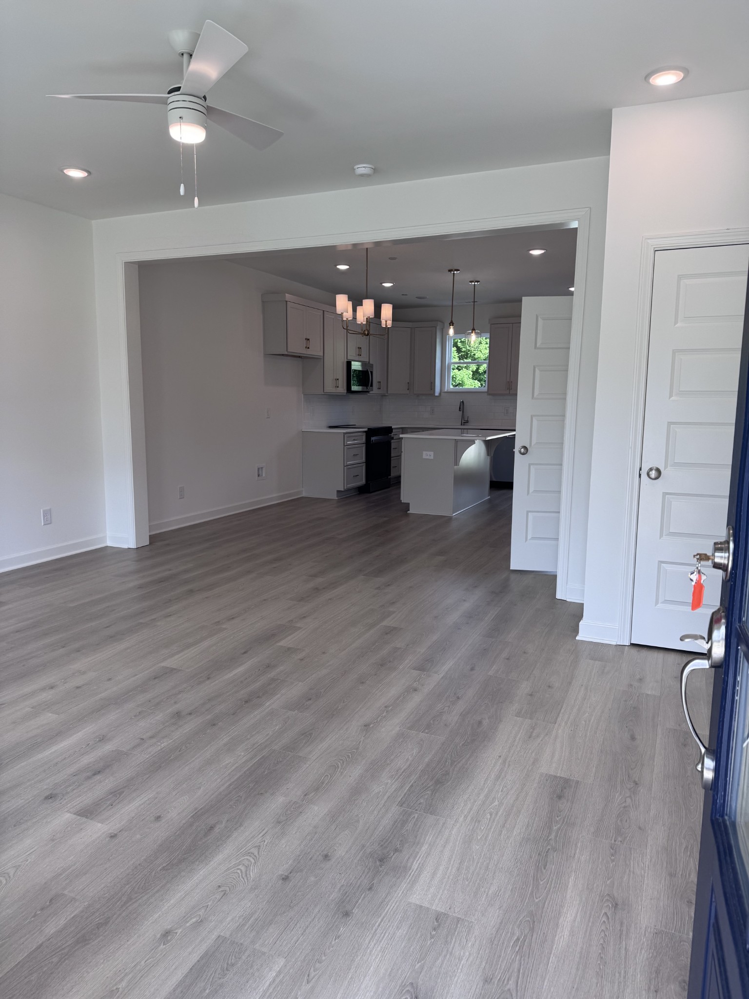 1963 Amacher Drive Spring Hill, TN 37174 - Photo 2 of 17 an entryway and an livingroom with furniture