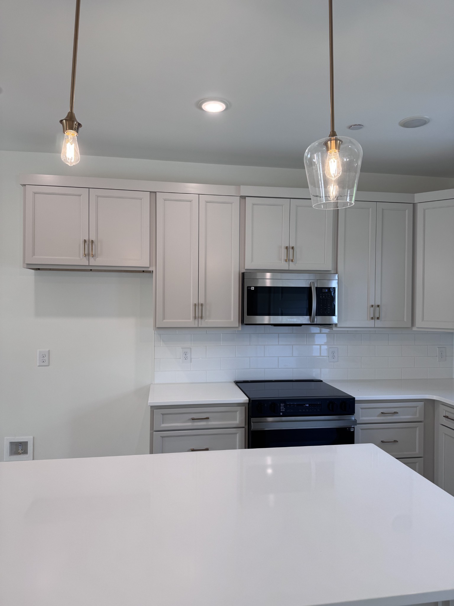 1963 Amacher Drive Spring Hill, TN 37174 - Photo 4 of 17 a kitchen with stainless steel appliances granite countertop a stove and cabinets
