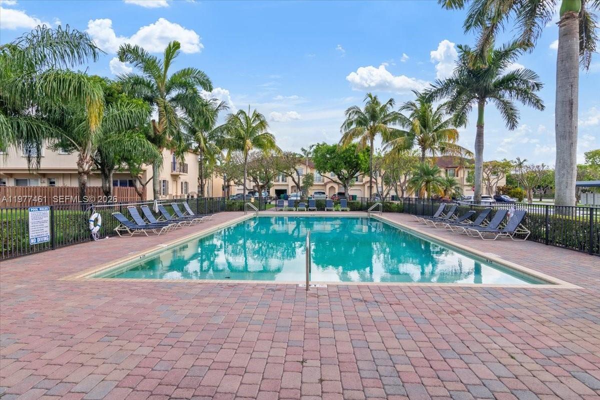 12958 Southwest 135th Street Miami, FL 33186 - Photo 13 of 14 a house with outdoor space and sitting space