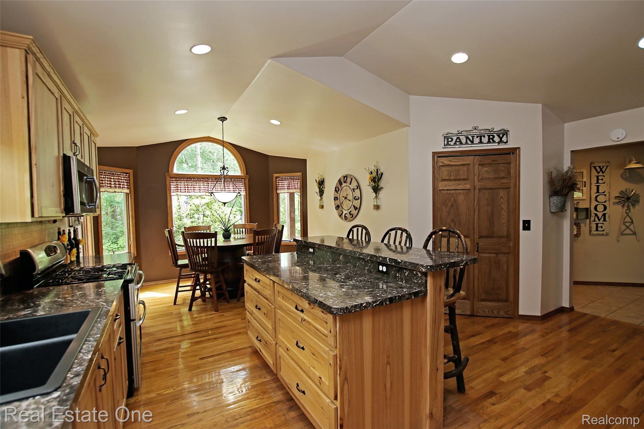 5621 Rochester Road Dryden, MI 48428 - Photo 10 of 52 Tons of cabinets, counter space and pantry
