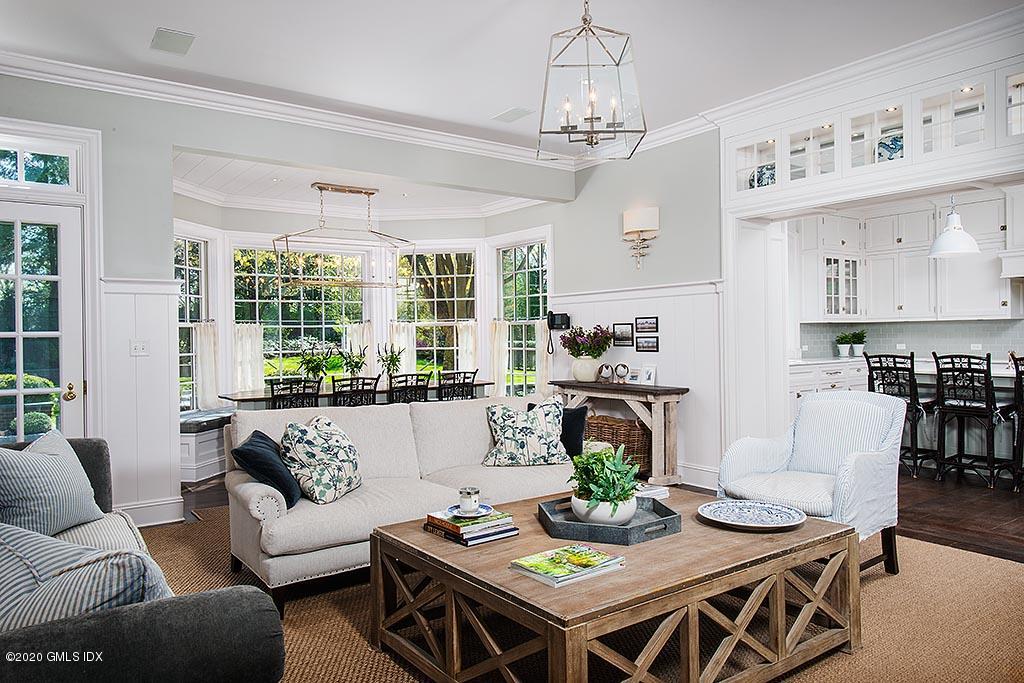 27 Midwood Road Greenwich, CT 06830 - Photo 12 of 30 a living room with furniture kitchen view and large windows