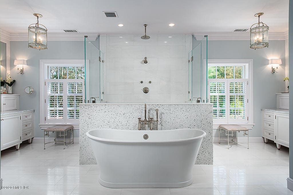27 Midwood Road Greenwich, CT 06830 - Photo 16 of 30 a spacious bathroom with a bathtub and 2 sink