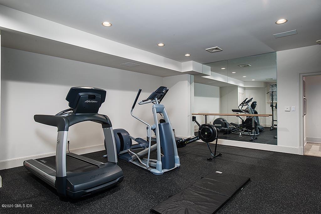 27 Midwood Road Greenwich, CT 06830 - Photo 20 of 30 a room with gym equipment and wooden floor
