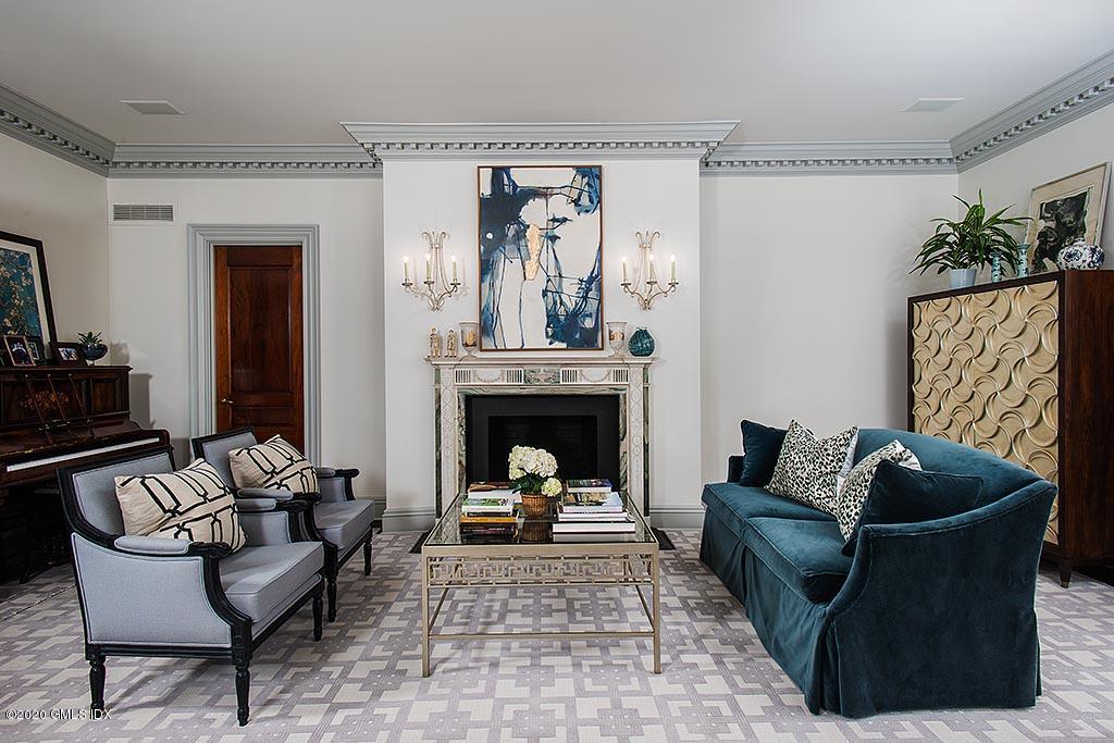 27 Midwood Road Greenwich, CT 06830 - Photo 5 of 30 a living room with furniture and a fireplace