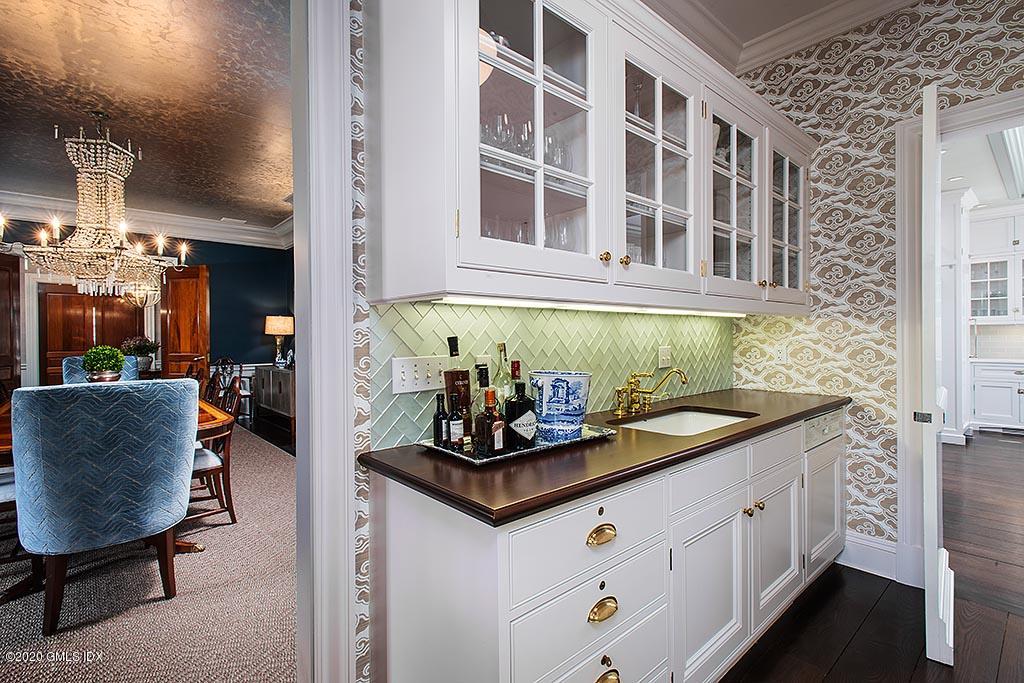 27 Midwood Road Greenwich, CT 06830 - Photo 8 of 30 a kitchen with stainless steel appliances granite countertop a sink and cabinets