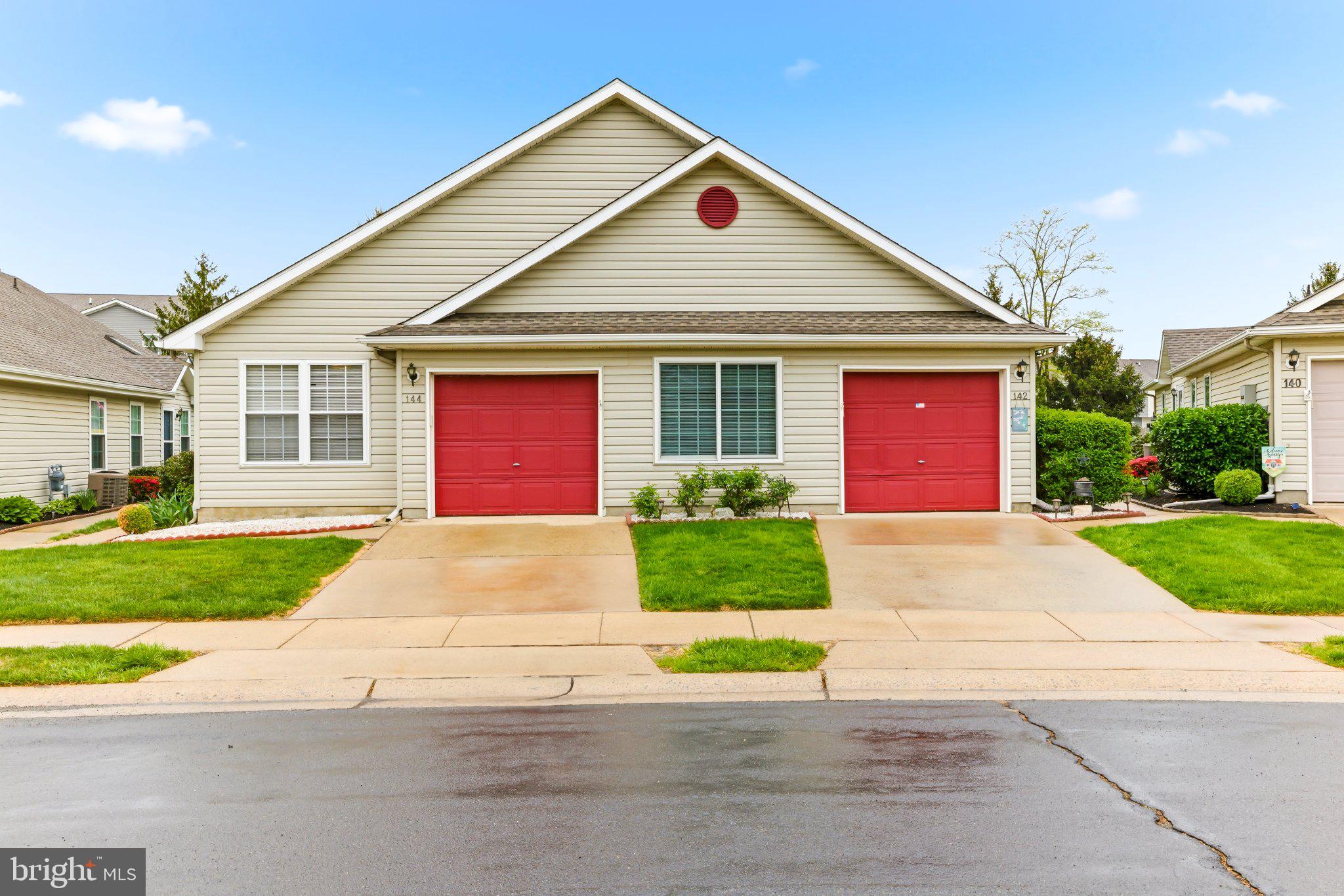 144 Alexander Road Beverly, NJ 08010 - Photo 2 of 23 Charming duplex with vibrant red doors.