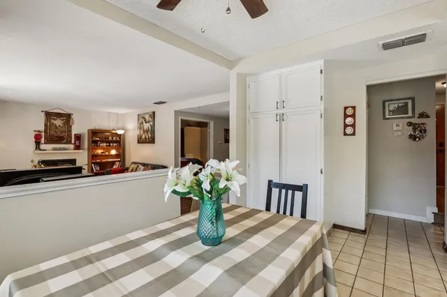 a kitchen with stainless steel appliances granite countertop a stove a microwave and cabinets