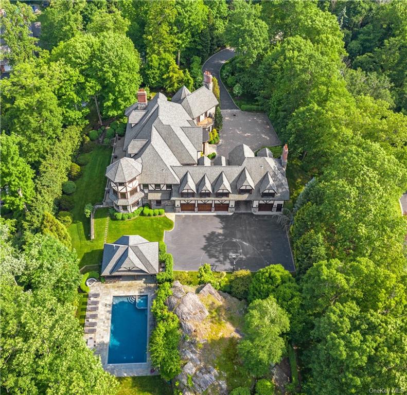 63 Wrights Mill Road Armonk, NY 10504 - Photo 1 of 1 an aerial view of residential house with outdoor space and swimming pool