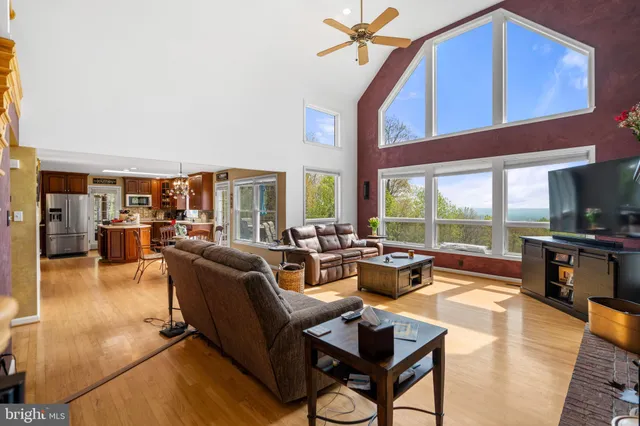a bathroom with a bath tub a toilet and a shower