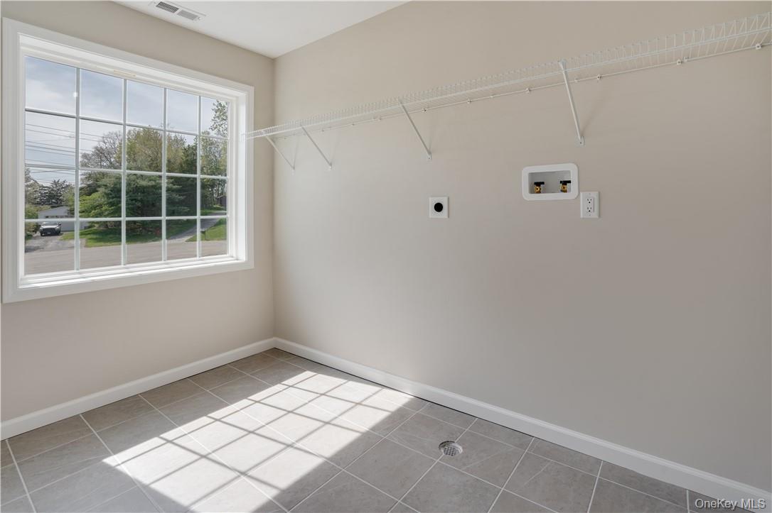 991 Freedom Road Pleasant Valley, NY 12569 - Photo 19 of 23 a view of empty room with windows