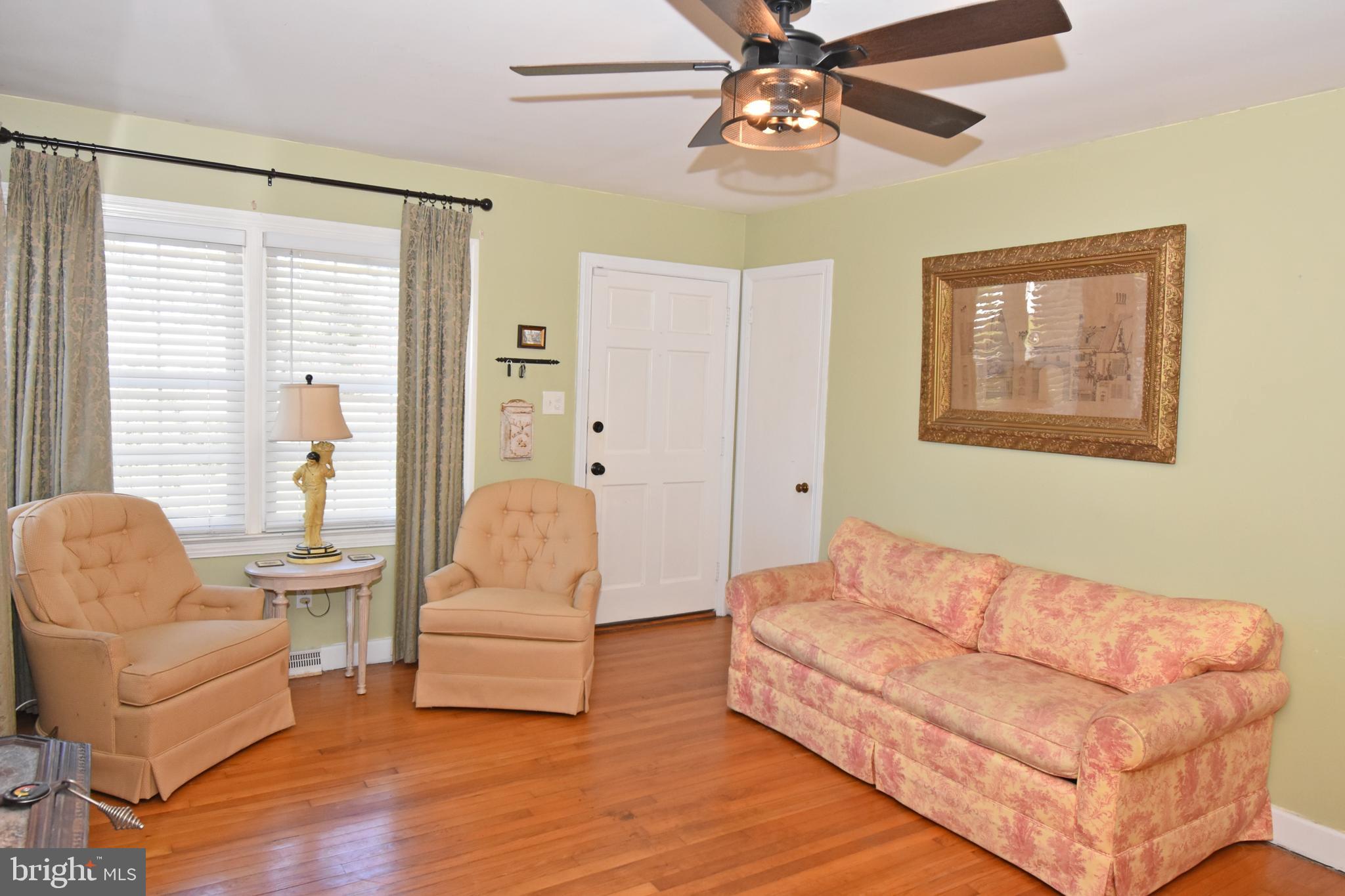 30223 Mt Vernon Road Princess Anne, MD 21853 - Photo 15 of 53 a living room with furniture and a large window
