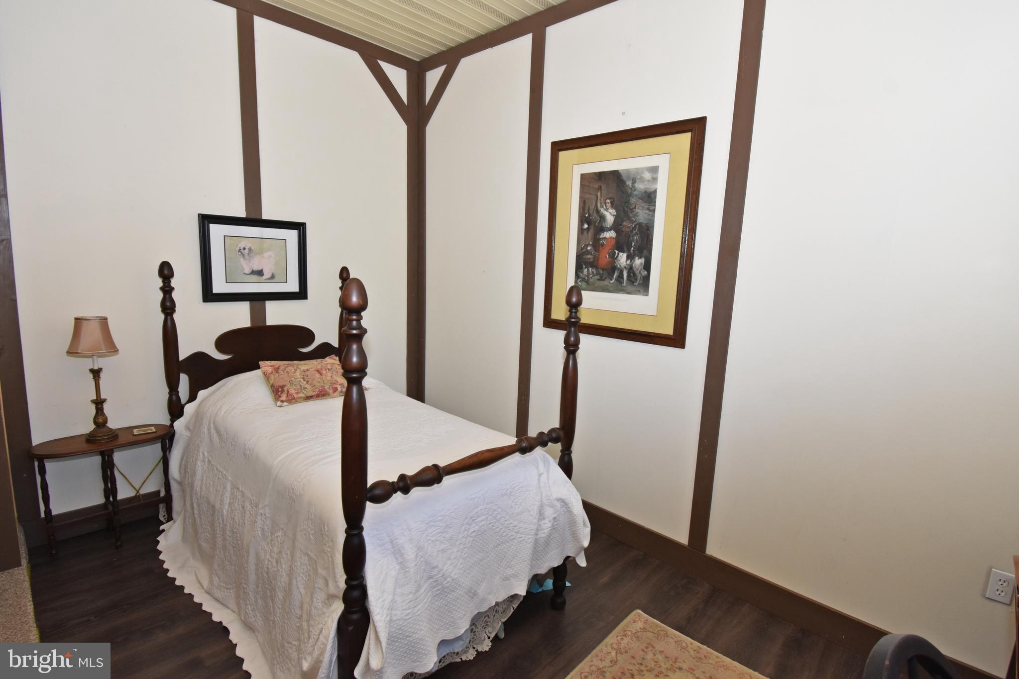 30223 Mt Vernon Road Princess Anne, MD 21853 - Photo 31 of 53 a bedroom with a bed and a window