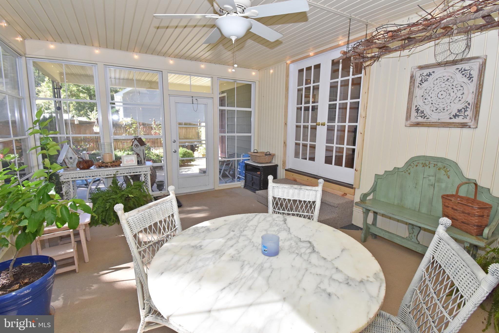 30223 Mt Vernon Road Princess Anne, MD 21853 - Photo 34 of 53 a living room with furniture and a large window
