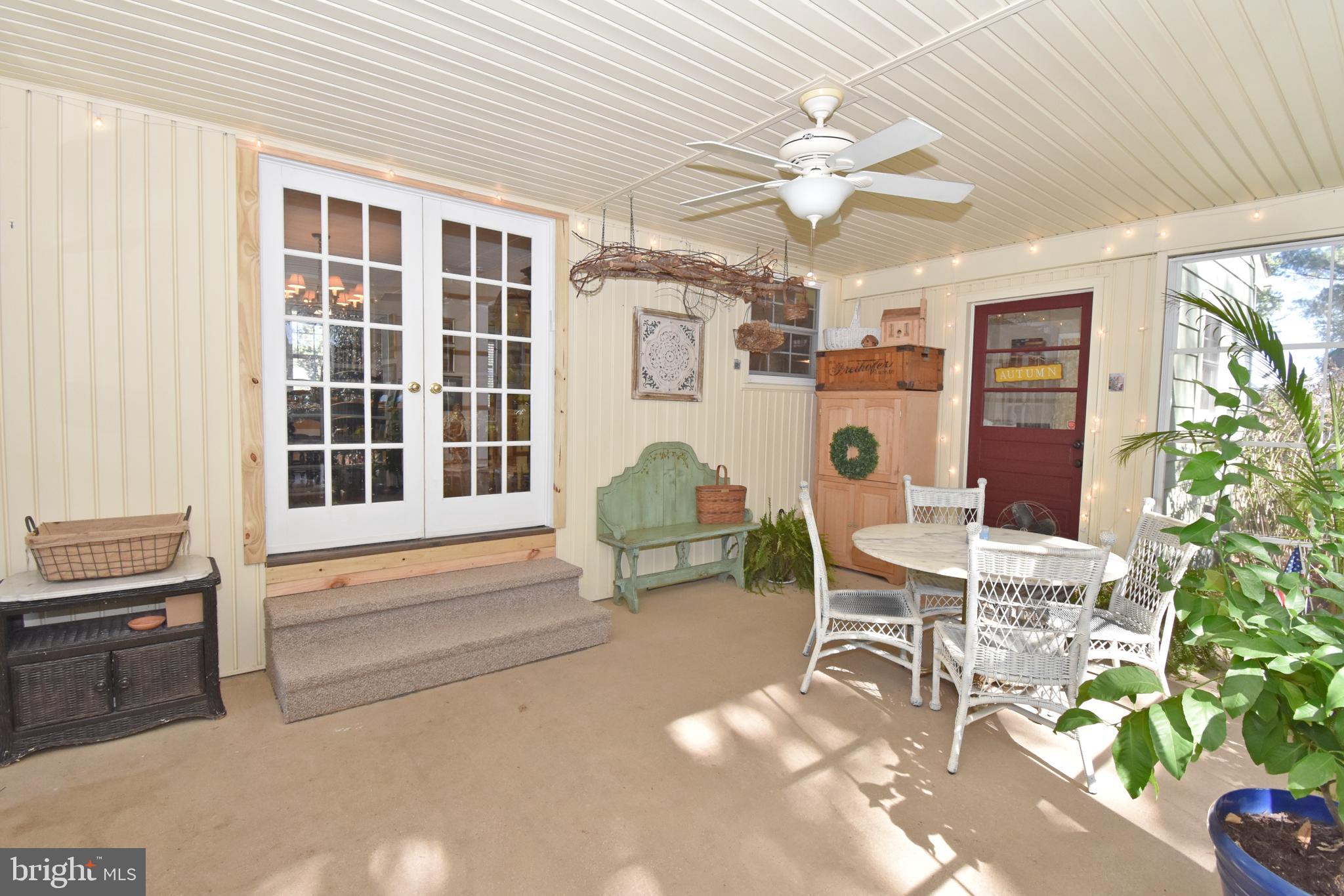 30223 Mt Vernon Road Princess Anne, MD 21853 - Photo 35 of 53 a living room with furniture and a large window