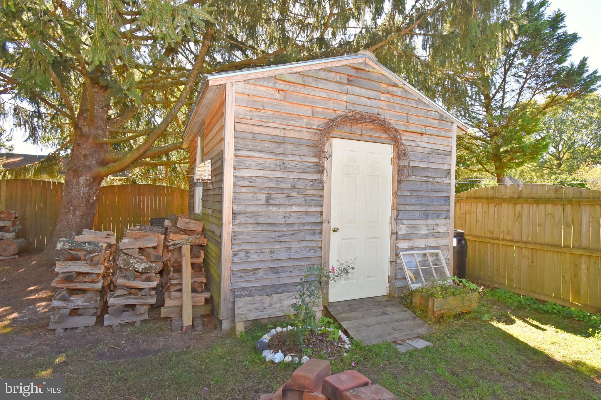 30223 Mt Vernon Road Princess Anne, MD 21853 - Photo 37 of 53 a front view of a house with garden