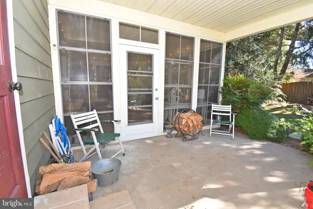 a view of a chairs and tables in the patio